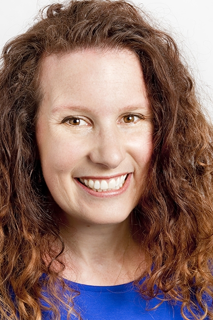 Megan Sayer: professional woman without fluffy hair. 