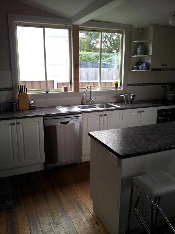 It has a dishwasher!! And actually IN the kitchen!! Seriously folks, if yours is in the laundry (like mine has been for years) you should put it in the kitchen. Man those things can change a woman's life!